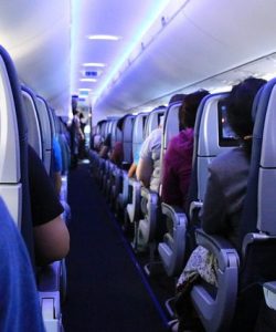Please Return Your Seatback to its Full and Upright Position!